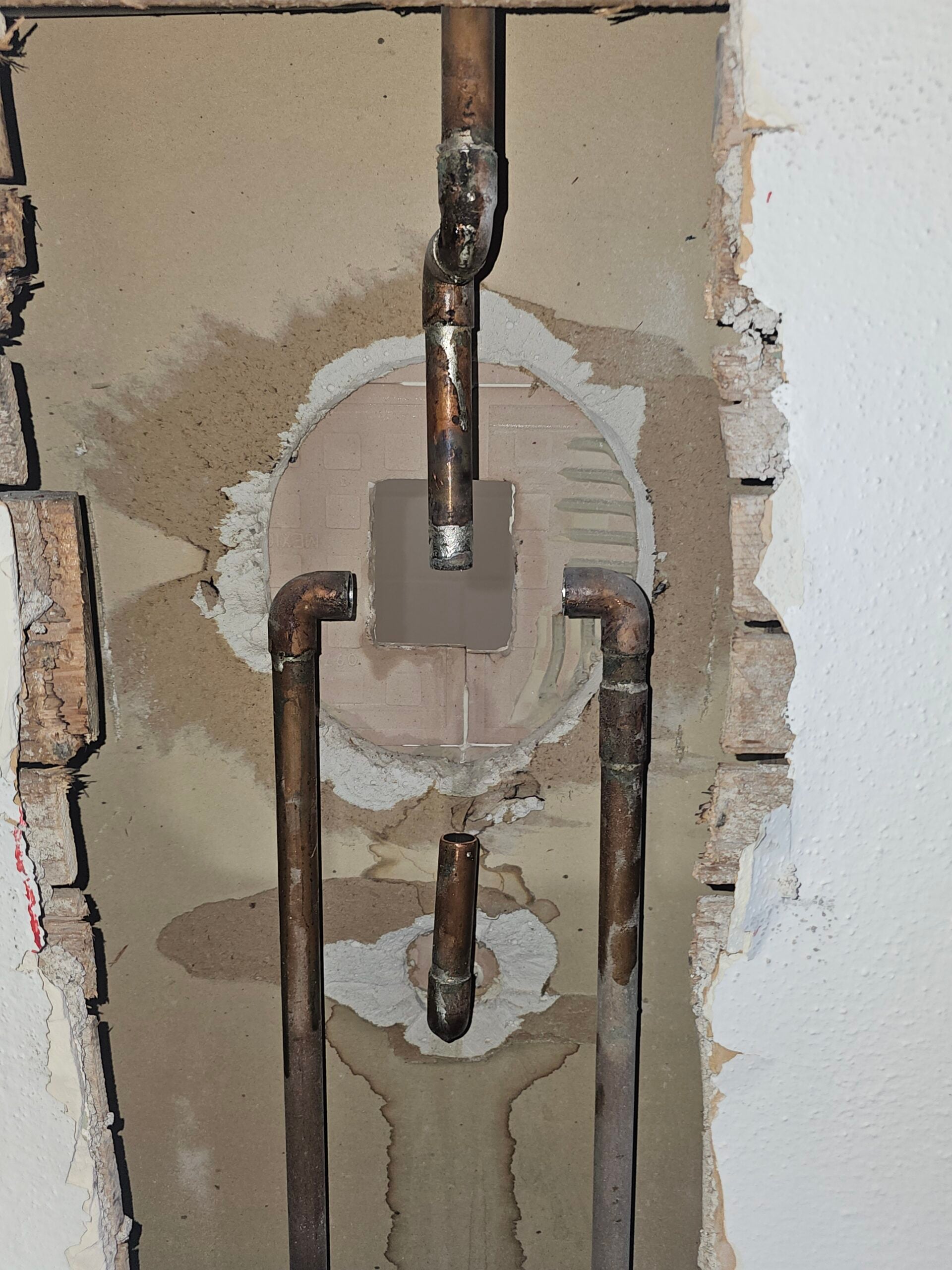 Wall Opened to Access Corroded Shower Supply Lines by Titan Plumbing Services LLC in Douglas County Colorado